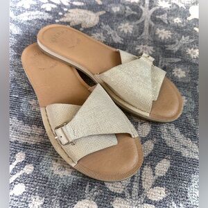 Sperry Seaport slide sandals with a metallic leather or fabric upper